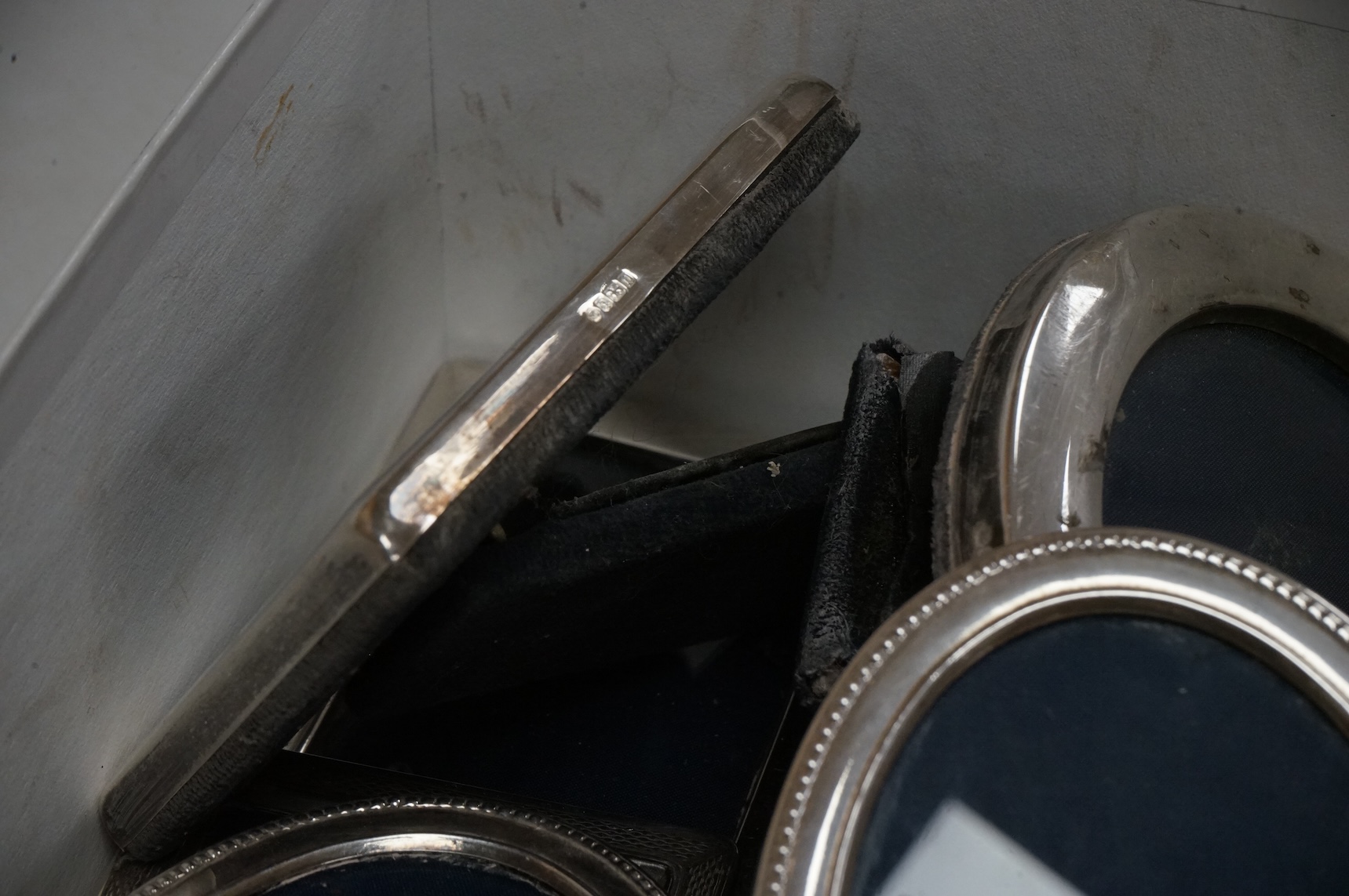 Four assorted pairs of modern silver mounted photograph frames, including Carr's Of Sheffield, 1992/3 and 1990, together with twelve other small assorted modern silver mounted photograph frames, largest 12.9cm and a silv